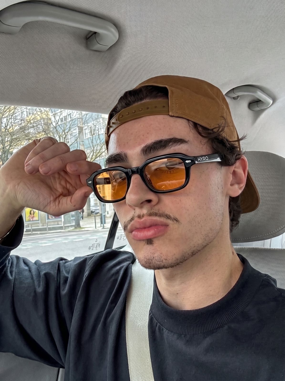 Content creator wearing HYRO® Frame Amber